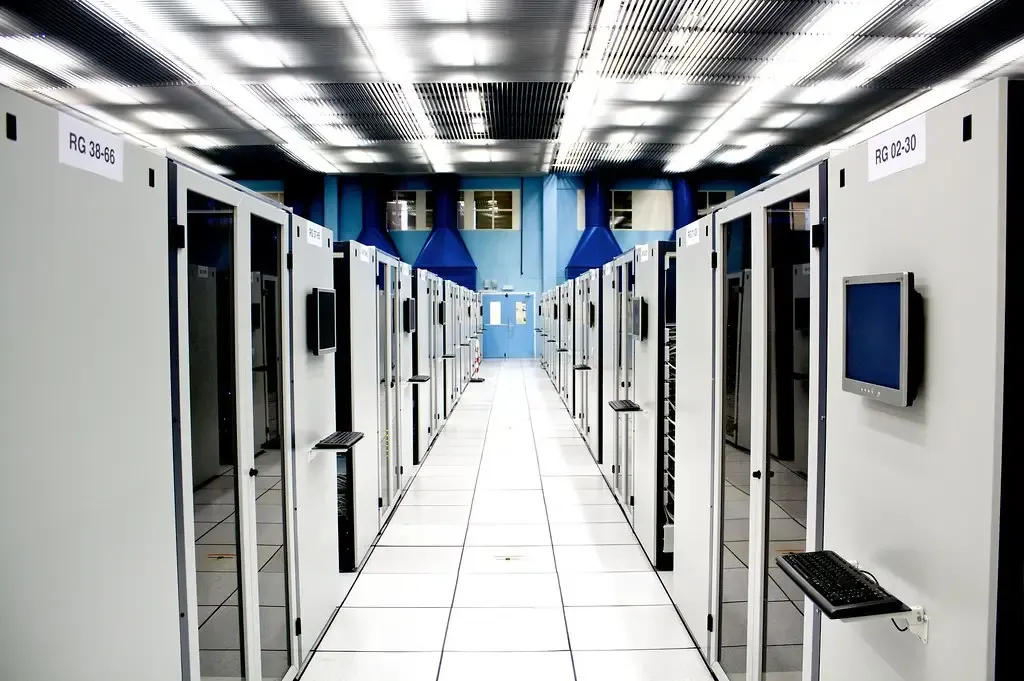 An aisle between cabinets in a data centre